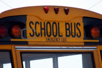Close up on a school bus sign