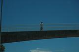 Guy on a bridge