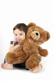 Baby Girl hugging her teddy