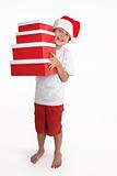 Child holding a stack of gift boxes