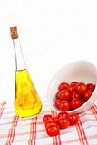 Olive oil bottle and tomatos cherry