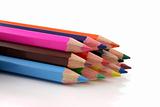 Stack of colored pencils on a white background
