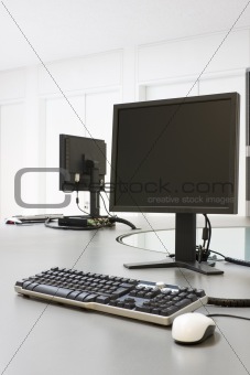 Two computers in an office