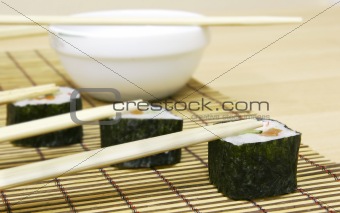 set of sushi with chopsticks