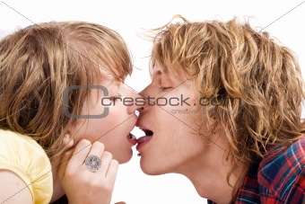 Portrait of the kissing young beauty couple 1