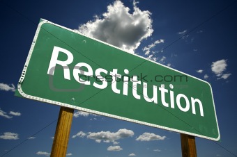 Restitution Road Sign