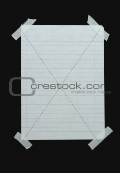 piece of lined paper stuck with tape