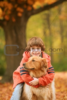 Boy Hugging the Dog
