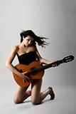 Sexy woman with a guitar