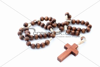 wooden rosary  on white