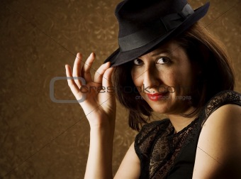 Hispanic Woman Tipping Her Hat