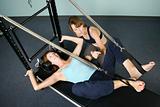 Woman Working Out With Personal Trainer
