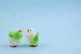 Two easter chicks on blue background