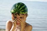 funny boy with watermelon helmet