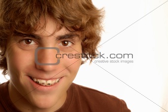 happy teen boy with braces