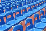 Rows of blue stadium seats