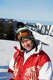 Portrait happy ski girl in red
