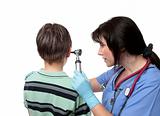 Doctor using otoscope
