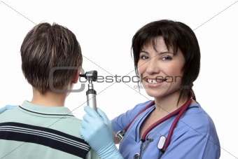 Doctor checking ears with otoscope