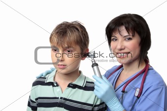Doctor checking childs ears