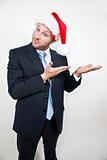 businessman wearing santa cap