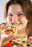 Girl eating Pizza
