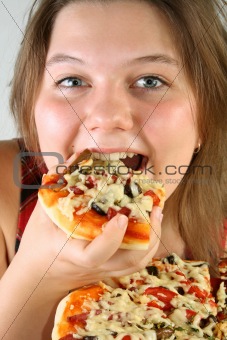 Girl eating Pizza