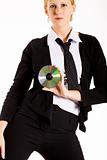 Business woman posing wioth a CD