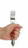 Man's hand holding a fork