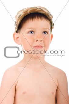Boy in a military cap