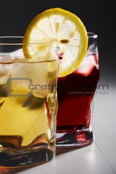 cocktail, a lemon and an ice