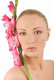 Spa woman with gladiolus