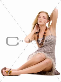 Young woman sitting on a floor