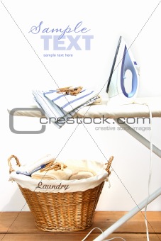 Ironing board with laundry 
