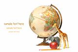 Globe with toy animals and apple on white