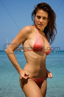 Beautiful young woman on a beach.