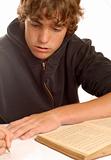 teen boy doing homework