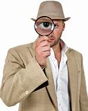 detective holding magnifier