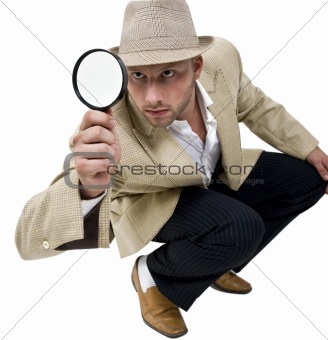 man with fedora hat and magnifier
