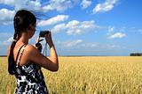 girl photographes the nature