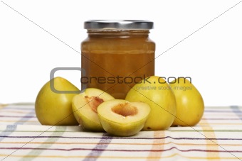 Plum jam and some fresh fruits 