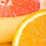 Orange, grapefruit and banana close up