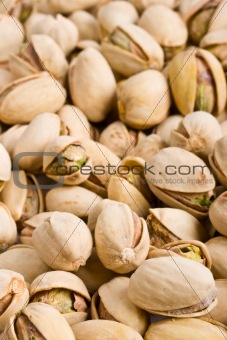 Pile of pistachio nuts close up