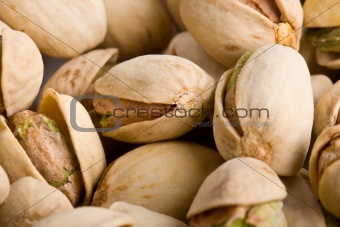 Pile of pistachio nuts close up