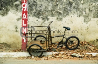Tricycle chained to a post in Nicaragua