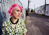 Woman with Pink Hair in an Alley