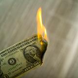 close up of money on fire