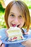 Girl eating a cake