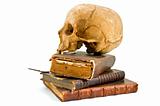 skull and old books