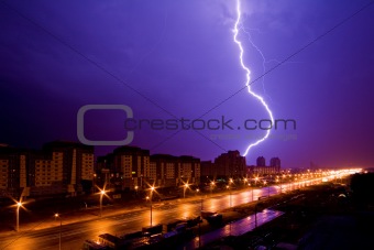 Lightning above night city
